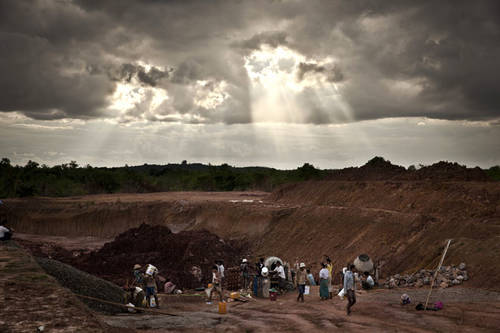 Patrick Brown exhibiting in association with Human Rights Watch at the Myanmar Deitta gallery in Yangon, Myanmar